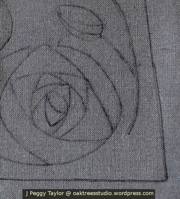 Charcoal outline of design on linen